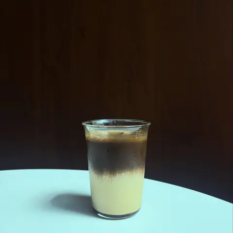Layered iced earl grey vanilla hojicha latte